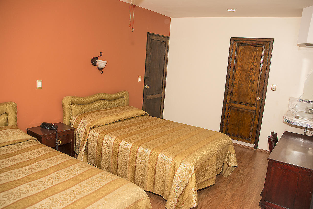 Hotel Roma Durango Phòng bức ảnh